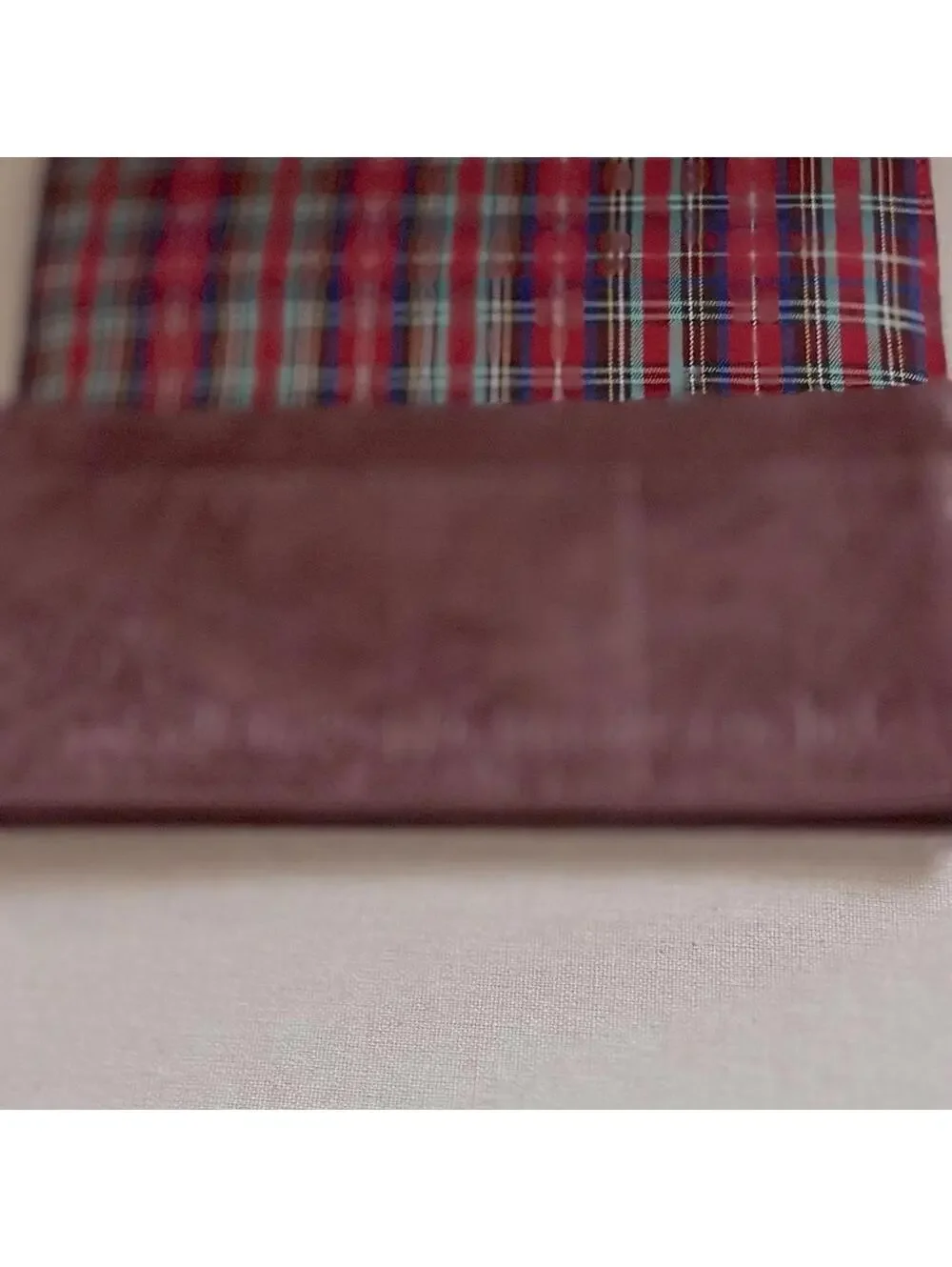 Vintage Wanderlust burgundy leather passport / travel wallet with plaid lining.